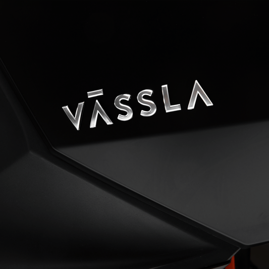 Vässla Side emblem pair